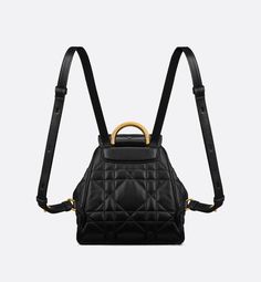 New for Cruise 2025, the Dior Caro backpack embodies modern and elegant style. Crafted in black lambskin elevated by Macrocannage topstitching, the design features a flap adorned with an antique gold-finish metal CD signature that opens to reveal a drawstring main compartment, while a small flap pocket can hold all the essentials. The small backpack has a gold-finish handle and adjustable straps for added comfort.. Evening Leather Backpack With Detachable Strap, Luxury Black Backpack For Evening, Luxury Black Evening Backpack, Luxury Leather Evening Backpack, Dior Caro, Louis Vuitton Shoulder Bag, Small Backpack, Black Backpack, Flap Pocket