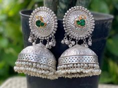 Silver Jhumka with quartz stone and pearl strings Bohemian Jhumkas With Latkans For Gift, Bohemian Jhumkas With Latkans As Gift, Handmade Jhumkas For Rituals And Festivals, Bohemian Jhumkas With Latkans For Festivals, Elegant Jhumkas For Festive Occasions, Bohemian White Jhumkas With Latkans, White Bohemian Jhumkas With Latkans, Fusion Style Jhumkas With Latkans For Gift, Navratri Festival Jhumkas With Latkans