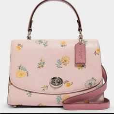 New With Tags. Tilly Top Handle With Dandelion Print On Soft Pink Refined Pebble Leather. Turnlock Closure. Comes With Detachable Shoulder Strap. Approx. 9.75"X7"X4.25". Coach Floral Print Bags For Everyday Use, Spring Coach Top Handle Bag, Coach Top Handle Bag For Spring, Elegant Coach Bags With Floral Print, Designer Bags With Floral Print For Spring, Designer Floral Print Bags For Spring, Designer Coach Bags For Spring, Dandelion Print, Bags Coach