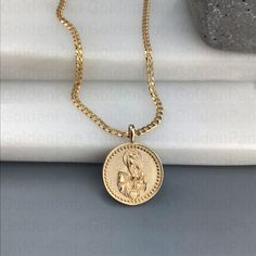 Please check the dimensions to be sure about the size! 2.7 x 1.7 cm (with the bail) 1.7 x 1.7 cm (without the bail) The inner dimensions of the bail: about 2.5 x 3.5 mm Chain options: - Chain No1: about 1mm (thickness) - Chain No2: about 2mm (thickness) - Chain length: 40cm /15,7 inches 45cm /17,7 inches 50cm /19,6 inches 55cm /21,6 inches 60cm /23.6 inches ✔Material of pendants: Solid gold 14k ✔Material of chains: Solid gold 14k ✔Metal Stamp: 585 (for 14k) ✔Backside engraving without extra cost Gold Plated Spiritual Medallion Jewelry, Spiritual Yellow Gold Coin Pendant, Gold Plated Spiritual Round Pendant, Gold Jewelry With Large Cross Pendant, Symbolic Gold Jewelry With Square Pendant, Symbolic Gold Square Pendant Jewelry, Gold Symbolic Square Pendant Jewelry, Gold Oval Pendant Spiritual Jewelry, Yellow Gold Coin Pendant Cross Jewelry