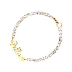 A classic look just for her, this glittering bracelet is certain to delight. A row of round stones radiate optimal shimmer. Uniquely designed, each shimmering stone is set to appear extra large and more brilliant, creating twice the sparkle. This classic name bracelet can come with yours or your loved one's name. She'll never tire of wearing this classic and sophisticated bracelet.Carat Weight: 5.78 ctStone Size: 2.8 mmNumber of Stones: 34 Stone Color: Diamond WhiteStone Shape: RoundMaterial: 92 Diamond White Bracelets With Sparkling Stones, Round, Classic Crystal Diamond Bracelet With Sparkly Stones, Round Diamond Crystal Bracelet With Sparkling Stones, Elegant Gold Crystal Bracelet Personalized, Dazzling Cubic Zirconia Bracelets With Rhinestones, Classic Diamond Bracelet With Sparkling Stones, Glamorous Diamond Bracelet With Rhinestones, Dazzling Rhinestone Cubic Zirconia Bracelets, Dazzling Crystal Bracelet