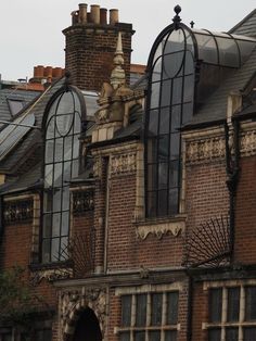 an old brick building with lots of windows