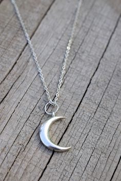 High quality necklace Celestial Jewelry Crescent Moon Necklace Crystal Necklace Statement Necklace Jewelry Women Valentine Gift by Geminimalist. It is a Solid 925 Sterling Silver Crescent Moon Necklace which Makes it a perfect desirable gift for special women in your life. Even it adds up some compliment in your beauty. ✧ WHAT YOU WILL GET *Size of Pendant18-20mm long *HIgh Grade Solid 925 Sterling Silver. *Hypoallergenic metal is used in the Necklace. *Thickness of the chain is 3mm(approx.) *Tr Everyday Half Moon Phase Necklace, Everyday Half Moon Charm Necklace, Minimalist Crescent Moon Phase Charm Necklace, Minimalist Half Moon Phase Necklace, Minimalist Jewelry With Moon Charm, Minimalist Crescent Charm Necklace With Clavicle Chain, Minimalist Half Moon Necklace With Adjustable Chain, Minimalist Crescent Clavicle Chain Charm Necklace, Minimalist Moon Shape Charm Necklace With Clavicle Chain