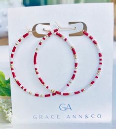 Dainty yet bold, these seed bead hoops are the kind of earrings you'll forget you're wearing - until the next compliment is made, that is. Deep Red, white miyuki seed beads and 2mm gold filled beads are hand threaded onto a 14k gold filled 45 mm hoop in a fun-loving design that you'll reach for time and time again. These earrings are hypoallergenic and will not tarnish! Perfect for Alabama, Arkansas game day or any occasion!!  Xoxo,  Shelly Red Hoop Jewelry For Everyday, Everyday Red Hoop Jewelry, White 14k Gold Filled Hoop Jewelry, White Hoop Jewelry With Tiny Beads, College Gameday, Gold Filled Hoops, Earrings Red, Beaded Hoops, Fun Loving