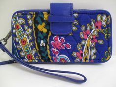 Vera Bradley Wristlet Clutch Wallet Purple Floral Zip Around Phone Case NWOT $70 *Item is new without tags. Item does not have any marks or blemishes. Items tags were lost during shipping. Please see pictures and description below for more details.*  Microfiber is lightweight, Multi-colored polyester Provides RFID protection for credit and debit cards *(What is RFID?-RFID blocking wallets block RFID signals using electromagnetic enclosure technology called a Faraday cage. This technology is said Multicolor Rectangular Wristlet With Mobile Phone Bag, Rectangular Travel Wristlet With Card Slots, Multicolor Rectangular Wristlet For Mobile Phone, Multicolor Rectangular Wristlet For Daily Use, Rectangular Wristlet With Card Slots For Travel, Daily Use Rectangular Wristlet With Interior Card Slots, Daily Use Rectangular Wristlet With Card Slots, Casual Rectangular Wristlet With Removable Pouch, Casual Multicolor Rectangular Coin Purse