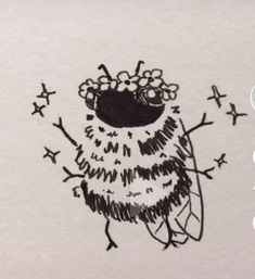 a drawing of an owl with flowers on its head