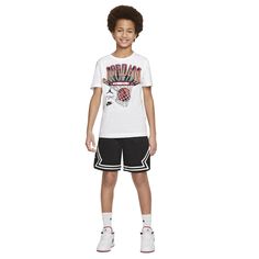 Run, jump, and play in the Jordan Air Diamond Dri-FIT Shorts. This classic style is breathable and lightweight so your little athlete can keep at it in comfort. Dri-FIT technology helps keep little ones dry and comfortable. A double-layer mesh fabric feels soft, light, and breathable. An elastic waistband stretches to give you a snug fit. Standard Fit for a relaxed, easy feel Side pockets. Fabric: 100% polyester. Machine wash. Imported. Casual White Activewear For Play, Buy Jordans, Jordan Air, Kids Shorts, Soft Light, Big Boys, Mesh Fabric, Workout Shorts, Wardrobe Essentials