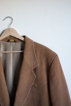 Beautiful heavy weight tan corduroy western jacket with perfect elbow patches. Fits like an xl or xxl and is in excellent condition. Please reach out via connect@shophedda.com for more photos or information. Found items are final sale. Brown Corduroy Single-breasted Sport Coat, Brown Single-breasted Corduroy Sport Coat, Brown Corduroy Sport Coat For Fall, Vintage Corduroy Blazer For Fall, Western Jacket, Elbow Patches, Corduroy Jacket, Heavy Weight, More Photos