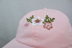 Hand Embroidered Pastel Pink Floral hat. The perfect addition to your Spring/Summer wardrobe this season, every design is hand drawn and hand embroidered onto the hat meaning that each one is individually unique. 🌿 Perfect for everyday wear or makes a great gift. 🌿 One size fits all with an adjustable buckle on the back. 🌿 The cap is 100% cotton embroidered with cotton thread. 🌿 Care instructions - Hand wash warm 30oC. ** Please note that hat colours may differ slightly due to the lighting o Ladies Cap, Hat For Summer, Pink Baseball Hat, Festival Hat, Embroidered Cap, Floral Hat, Panel Hat, Embroidered Caps, Summer Festival