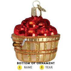 a basket filled with red and gold ornaments