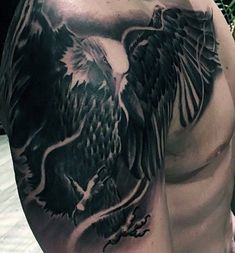 a man with an eagle tattoo on his arm