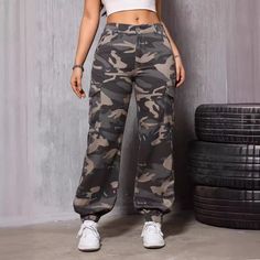 Embrace a bold and edgy look with our Camouflage Straight Bottom Elastic Band Jeans, designed to keep you stylish and comfortable throughout the summer. These retro-inspired jeans feature a classic straight-leg cut that offers a relaxed fit while still maintaining a sleek silhouette, making them perfect for casual outings, outdoor adventures, or even an edgy streetwear style. The all-over camouflage print adds a trendy, military-inspired vibe, giving your outfit a distinctive edge.Crafted from high-quality, lightweight denim, these jeans are perfect for keeping cool during warm summer days. The elastic band at the waist ensures a snug yet comfortable fit, allowing you to move freely without any restriction. This all-matching design means that these jeans pair effortlessly with a wide range Camouflage Jeans, Edgy Streetwear, Street Fits, Work Pants Women, Camouflage Colors, Plaid Vest, Denim Patterns, Winter Casual, Winter Women