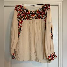 Long Sleeve Blouse, Embroidered On Neck, Cuffs, And Sleeves. Never Worn. Fall Cotton Blouse With Embroidered Cuffs, Spring Long Sleeve Top With Embroidered Cuffs, Spring Long Sleeve Embroidered Top, Casual Long Sleeve Blouse With Embroidered Cuffs, Summer Long Sleeve Blouse With Embroidered Cuffs, Embroidered Long Sleeve Blouse For Brunch, Bohemian Cotton Blouse With Embroidered Cuffs, Long Sleeve Embroidered Blouse For Brunch, Folk Style Long Sleeve Top With Embroidered Cuffs