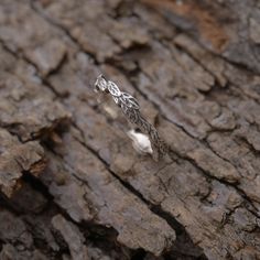 Unique artistic ring with leaves in sterling silver. Tree branch ring 3.5mm wide. Nature inspired engagement ring. Friendship and nature lover artistic gift. Bohemian chic sterling silver leaf jewellery. Personalized with an engraved message on the inside. A twig oxidized sterling silver ring for women who enjoy the outdoors and nature. What makes this handmade 3.5 width ring so special is the texture and style of the oxidized sterling silver that resembles a small tree branch with various leave Nature-inspired Silver Stackable Rings For Anniversary, Silver Nature-inspired Stackable Rings For Anniversary, Silver Stackable Promise Rings With Nature-inspired Style, Silver Nature-inspired Stackable Rings For Promise, Nature-inspired Silver Stackable Rings, Formal Nature-inspired Sterling Silver Rings, Silver Leaf Ring As Gift, Nature-inspired Hand Forged Sterling Silver Rings, Silver Leaf Ring Gift