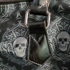 You know you want an exclusive Darkothica black and grey gothic skull purse! Sides, handles, and bottom are made with PU leather, and the front and back is a canvas material. Both sides have a snapped pocket on the outside and there is a zipper pocket inside. Lined brownish interior and large capacity. Double handles, measures approximately 13.4"(L) x 6.3"(W) x 9.0"(H). Design by Kayla Bailey Skull Purse, Gothic Skull, Zipper Top, Canvas Material, Black Grey, Inside Pocket, Zipper Pocket, Not Available, Pu Leather