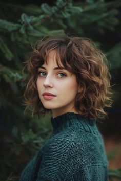 Embrace your wild side with the edgy and bold Wolf Cut, a hairstyle that exudes untamed confidence. 🐺💇‍♀️ Curly Wavy Bob With Bangs, Edgy Haircuts Curly Hair, Medium Length Curly Hair With Layers And Curtain Bangs, Short Curly Hair Wolf Cut, Curly Short Wolf Cut, Curly Hair Bob With Bangs, Wolf Cut Curly Hair Short, Wolf Cut Side Part, Curly Wolf Cut Short