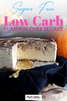 two pieces of low carb pumpkin cheesecake sitting on top of a blue cloth