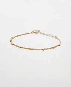 Slim and elegant bracelets never fail to impress us and we know every woman finds tons of uses for these in her collection. Meet all your dainty elegance goals with our Emery bracelet. The delicate design exudes tons of charm and femininity and will fit effortlessly into your hectic weekday dress-ups too.- Brass with Polyurethane Coating- Adjustable length of 7" to 9"- Available in Gold and Silver Dainty Adjustable Chain Bracelet For Everyday, Trendy Adjustable Charm Bracelet With Delicate Chain, Dainty Beaded Bracelet With Extender For Everyday, Delicate Chain Bracelet With Extender, Adjustable Delicate Chain Beaded Bracelets, Trendy Charm Bracelet With Delicate Chain, Elegant Metal Charm Bracelet With Delicate Chain, Dainty Beaded Bracelet For Everyday, Elegant Everyday Metal Charm Bracelet