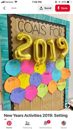 a bulletin board with balloons and the words goals for 2013 written in gold on it