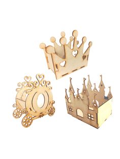 three pieces of wood are shown with crowns on each side and one piece is cut out to look like a castle