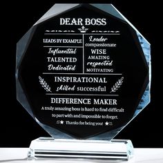 a clear glass award with the words dear boss and inspirationally written in black on it