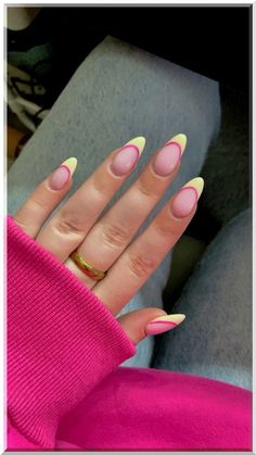 Capture the essence of sunny days with our radiant summer yellow nails! Flash a smile on your hands with a color that's as warm and inviting as a sunny afternoon. Pink Nails With Yellow Tips, Two Color French Tip Nails Summer, Yellow And Hot Pink Nails, Bright Yellow Tip Nails, Summer Nails Tips Designs, Alomd Nails Cute Summer, Pink Yellow Nail Art, Summer Yellow Nail Designs