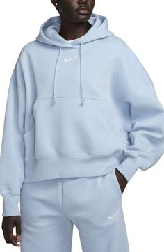 Supersoft fleece means all-day comfort in a dropped-shoulder hoodie perfect for relaxing at home or heading to the gym. 25 1/2" length (size Medium) Drawstring hood 80% cotton, 20% polyester Machine wash, tumble dry Imported Nike Sportswear Phoenix Fleece, Matching Sweats, Nike Sportswear Women, Luxury Loungewear, Loungewear Luxury, Nike Sweatshirts, Oversized Pullover, Nike Hoodie, Sportswear Women