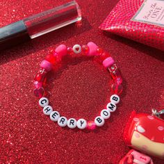 Strawberry Kandi or Cherry Kandi? Jewelry Care Tips, Cherry Bomb, Bracelets Handmade Beaded, Acrylic Beads, Bead Bracelet, Jewelry Care, Handmade Bracelets