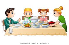 a group of people sitting at a table with food