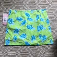 Lilly Pulitzer Reversible Skirt, New With Tags. Starboard Patch Design. Super Cute! Size 2 Green Lined Skort For The Beach, Green Vacation Skort, Green Skort For Vacation, Green Vacation Skort With Lined Skirt, Green Skirted Skort For Vacation, Green Lined Skort For Vacation, Casual Green Lined Swim Skirt, Green Mini Skort For The Beach, Green Mini Skort For Beach