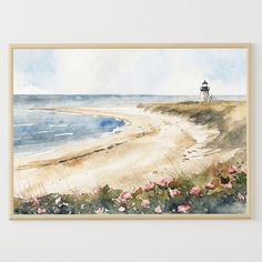 a watercolor painting of a lighthouse on the beach with pink flowers in front of it