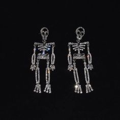 You will receive a pair of cool spooky skeleton earrings with earrings backs. Great for Halloween! Hypoallergenic Dimension: Length: 10cm Width: 3cm Edgy Nickel-free Skull Earrings, Edgy Skull-shaped Earrings For Gift, Adjustable Black Skull-shaped Earrings, Spooky Skeleton, Skeleton Earrings, Earrings Halloween, Halloween Jewelry, Earring Backs, Skeleton