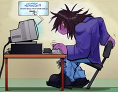 a person sitting at a desk with a computer