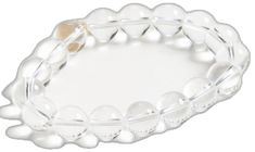 a white bracelet with beads on it