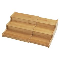 three wooden shelves with dividers on each side