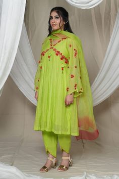 Green A-line kurta with thread embroidery in floral motifs. Paired with matching tulip pant, ombre dupatta and slip. - Aza Fashions Green V-neck Spring Sets, Spring Green V-neck Sets, Green V-neck Kurta With Resham Embroidery, Fitted Green V-neck Sets, Fitted Pista Green Sets For Spring, Spring Green Palazzo Set With Resham Embroidery, Green Cotton V-neck Set, Spring Festive Green Palazzo Set, Festive Green V-neck Sets