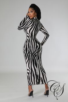 Turn heads in this bold zebra-print midi dress! Crafted from black and taupe material, this mock neck long sleeve stunner will give any ensemble a fashionable upgrade. And who can resist? Gold hoops and a sassy pair of boots complete the look with effortless chic. Don't miss out! Model is wearing a small Fabric: 95% Polyester 5% Spandex Hand wash cold, line dry. Do not bleach, iron or dry clean. Size Chart Zebra Print Dress Boohoo, Zebra Print Dress Summer, Zebra Print Dress Winter, Zebra Bodycon Dress, Zebra Print Dress Plus Size, Luxury Fitted Dress With Graphic Print, Luxury Chic Dresses With Graphic Print, Zebra Print Mesh Dress, Long Zebra Print Dress