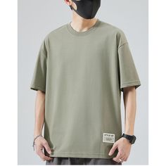 Ice Silk Cotton Crew Neck Khaki Green Oversized Basic Tee - graphictee.co Oversized Khaki Cotton T-shirt, Oversized Basic Solid Color T-shirt, Trendy Oversized Solid Color T-shirt, Oversized Solid Color Casual T-shirt, Oversized Solid Casual T-shirt, Oversized Casual T-shirt, Oversized Casual Solid Color T-shirt, Oversized Khaki Tops For Summer, Oversized Khaki Crew Neck Top