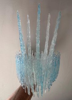 The Glacial Blue Ice Queen Crown headdress has 5 intricately formed, spectacular, transparent, glistening icicles surrounded by multiple layers of smaller glistening ice shards, all in beautiful variegated transparent glacial blue, just like glacial ice.  Now available with added iridescence to each icicle and ice shard! See the video and select 'with' or 'without' iridescence at the checkout.  To help ensure the headdress stays in place on every individual head shape, there is an option to have Ice Queen Crown, Ice Accessories, Ice Costume, Ice Shards, Ice Crown, Ice Queen Costume, Ice Dress, Crown Costume, Crown Headdress