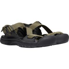 With the combined comfort of a lightweight sandal and a protective hiking shoe, the Zerraport II Sandal is an ideal everyday style. These versatile sandals keep our feet happy whether we're playing with the family at the beach or hiking up a trail laden with babbling creeks. The open-foot webbing lets water drain so our feet can dry quickly, preventing blisters and related discomfort, while the rugged closed-toe keeps our piggies protected from loose rocks and protruding roots. Comfortable Non-slip Hiking Sandals, Waterproof Closed Toe Sport Sandals For Outdoor, Durable Open Toe Sandals For Adventure, Closed Toe Sandals With Arch Support For Outdoor, Open Toe Sandals For Summer Camping, Durable Open Toe Sport Sandals For Adventure, Breathable Closed Toe Hiking Sandals, Breathable Closed Toe Sandals For Hiking, Breathable Open Toe Sandals For Outdoor Activities