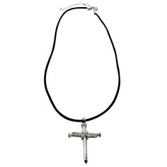 Nail Cross Necklace Silver Stainless Steel has the largest Nails we have ever cast for a nail cross necklace. This a hypo allergenic stainless steel pendant. This rather large Nail cross pendant features a flexible 22 inch soft black rubber cord with two inch extender that can expand the necklace to 24 inches max... Stainless Steel Nail Cross Necklace On Rubber details Item - LC88SRUB - American Design - Hypo Allergenic pendant - Solid Cast Stainless steel - Measures over 1-3/4 inch tall - Measu Adjustable Metal Cross Necklace, Nail Cross Necklace, Nail Cross, Steel Nail, Polish Silver, Stainless Steel Pendant, American Design, Black Rubber, Soft Black