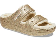 Crocs Classic Cozzzy Sandal - Shoes : Multi/Gold Glitter : This style comes with a removable Crocs Logo Jibbitz charm. Give your feet the control, comfort, and adaptive fit they require in the Crocs Classic Cozzzy Sandal. Chic and elegant design with all the feels of a slipper. Lightweight with durable construction. Easy slip-on entry. Classic rounded open toe. Contoured footbed for added comfort. Durable and lightweight molded EVA outsole with tread pattern for added traction. Textile upper, li Classic Cozzzy Sandal, Wip Bag, Fuzzy Slides, Pink Crocs, Men's Beanies, Saltwater Sandals, Glitter Sandals, Crocs Classic Clogs, Water Sandals