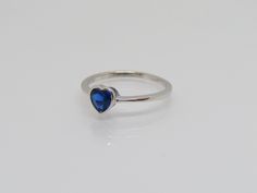 Vintage Sterling Silver Blue Sapphire Heart Ring....Marked 925...Total of weights 1.2grams... Size 7...Measure of Face 6MM...It's in very good condition. A Silver Heart Cut Sapphire Ring, Heart Cut Sapphire Ring In Sterling Silver, Heart Cut Sapphire Ring In Sterling Silver For Gift, Blue Heart-shaped Sterling Silver Rings, Heart-shaped Sapphire Ring For Gift, Sapphire Heart Ring, Blue Sapphire Ring, Blue Sapphire Rings, Sterling Silver Heart