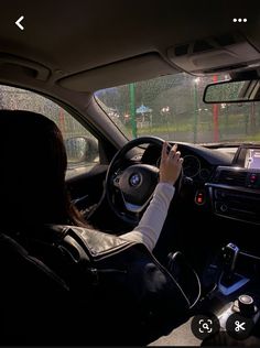 a person driving a car on a road