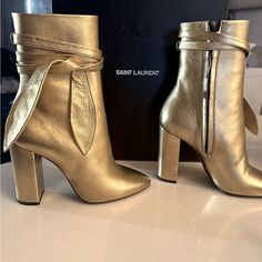 Brand New Ysl Authentic Gold Boots. Comes With Box And Bag. Please No Low Offers See Pictures They Are Selling Them Used For $700. I’m Open To Fair Offers Thx. Ysl Gold, Authentic Gold, Gold Boots, Yves Saint Laurent Shoes, Saint Laurent Shoes, Yves Saint Laurent, Bootie Boots, Saint Laurent, Ankle Boots