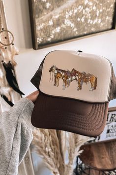 The cutest trucker we have made to date! If you are a horse lover you're gonna LOVE THIS ONE!   Printed on a foam trucker hat that's adjustable snap back Brown/Tan Adjustable Trucker Hat For Ranch, Fun Trucker Hat For Country Events, Country Style Trucker Hat For Ranch, Fun Trucker Hat For Country Events One Size, Fun Snapback Trucker Hat For Country Events, Trucker Hat For Rodeo, One Size Fits Most, Trucker Hat For Western-themed Events, Fun Adjustable Trucker Hat For Rodeo, Brown Trucker Hat For Western-themed Events