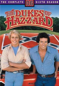 two men standing next to each other in front of a red car with the words, the duke's of hazzard