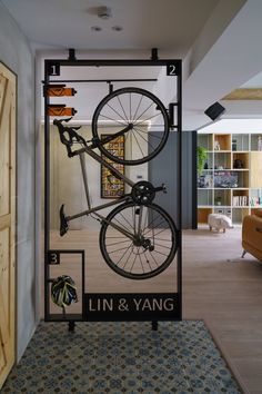 a bicycle mounted to the side of a door