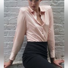 Pink Satin Bodysuit With Shoulder Pads. Size Xs. Gold Buttons. Chic Pink Stretch Blouse, Feminine Pink Blouse For Night Out, Fitted Peach Top For Party, Elegant Peach Tops For Party, Elegant Pink Stretch Top, Elegant Fitted Peach Blouse, Pink Elegant Formal Tops, Elegant Pink Formal Tops, Elegant Formal Pink Tops