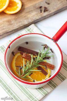 a bowl filled with orange slices and spices